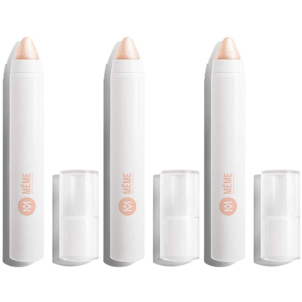 Drie witte oogschaduwpotloden met roze-gouden punt en doorzichtige dopjes.