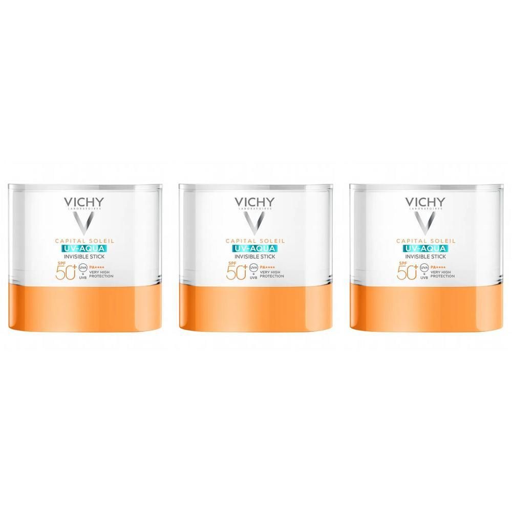 Trois sticks solaires Vichy Capital Soleil Invisible LSF50+ avec base orange et capuchon blanc.
