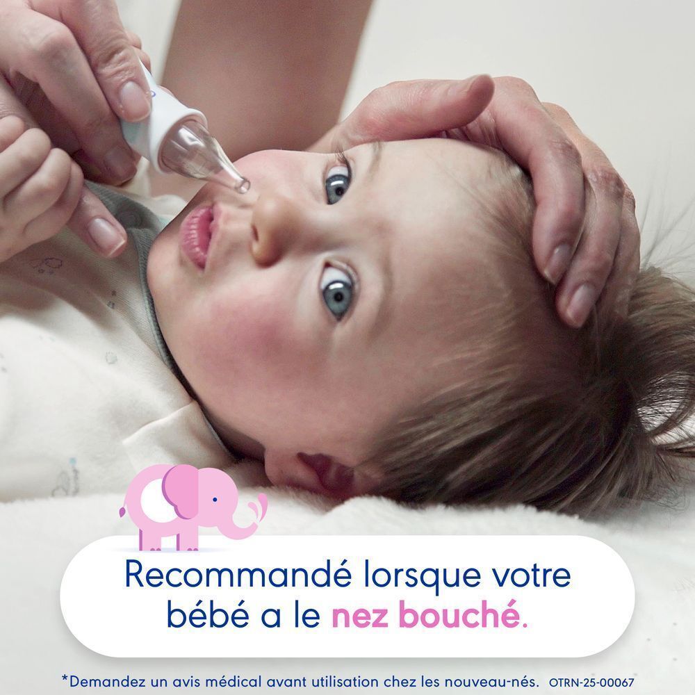 Un bébé est soigné avec un aspirateur nasal OtriCare Baby.