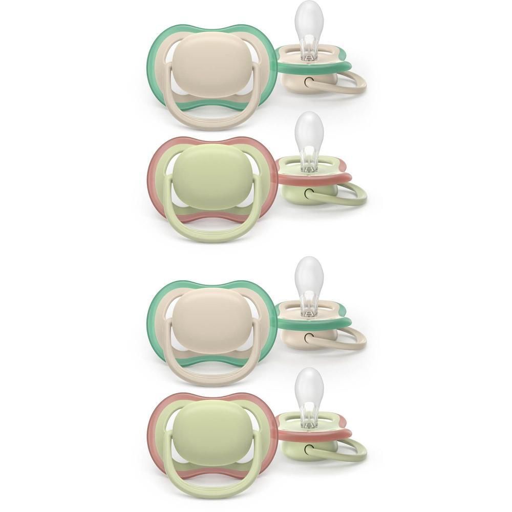 Vier fopspenen in beige, groen en roze. Twee naast elkaar en twee eronder.