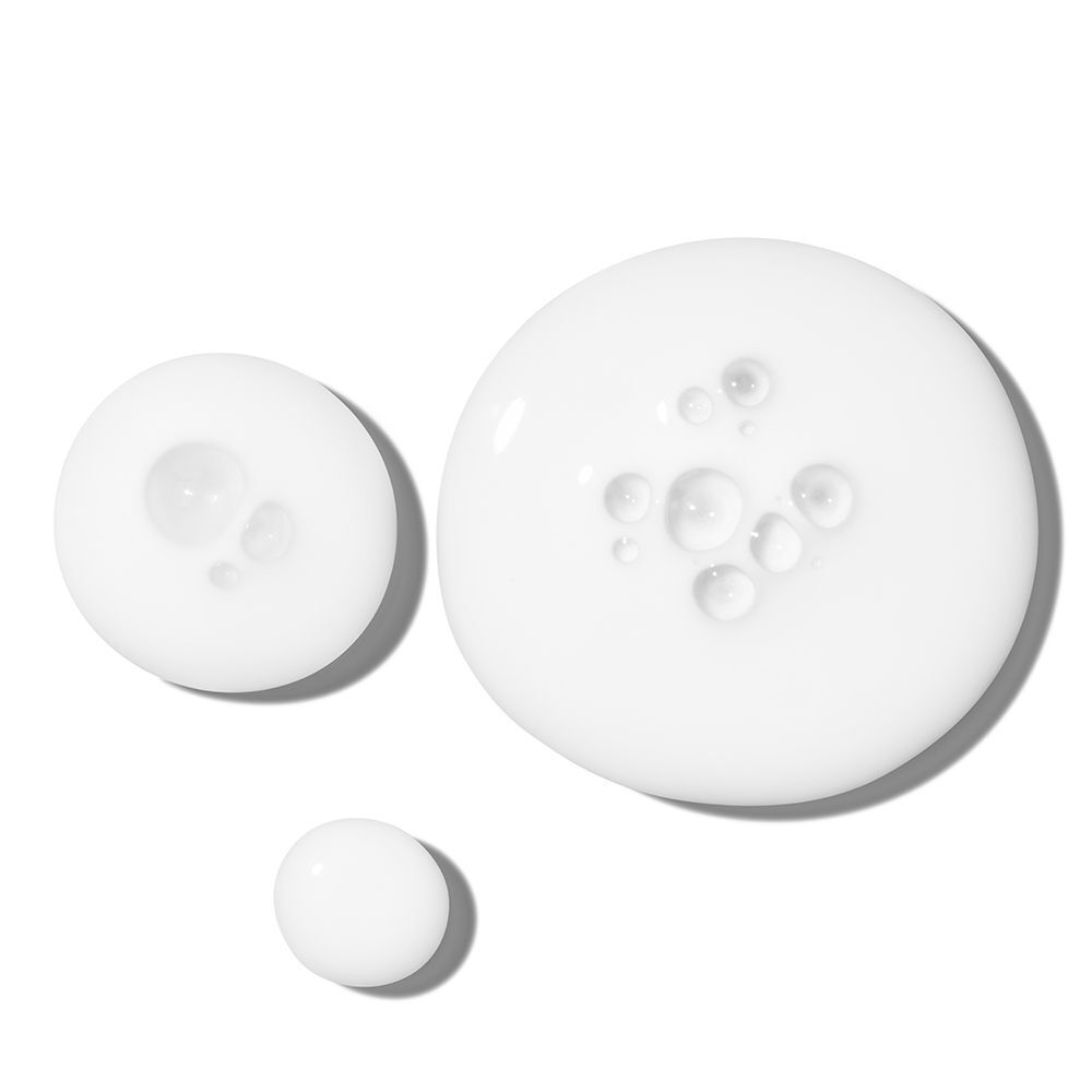 Druppels The Ordinary Rice Lipids + Ectoin Microemulsion met luchtbellen.