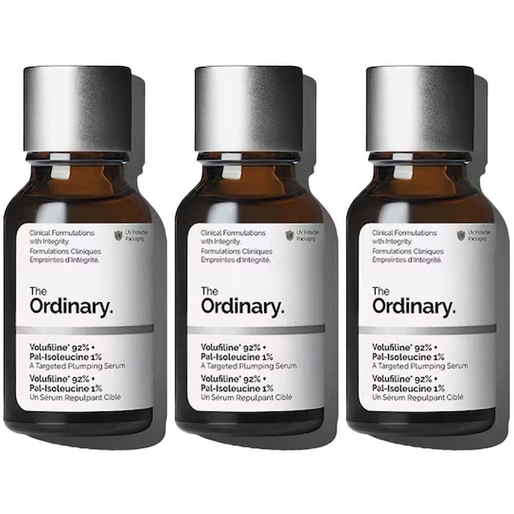 Drie bruine glazen flesjes met zilveren dopjes, elk met het etiket 'The Ordinary Volufiline 92% + Pal-Isoleucine 1%'.