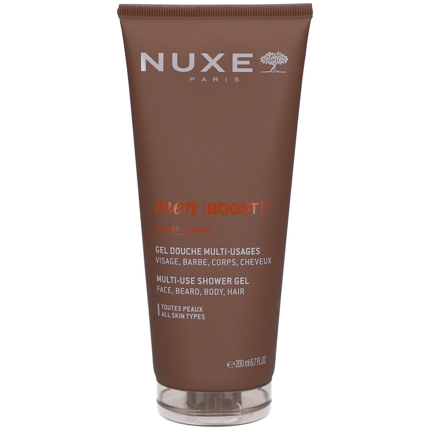 Tube de gel douche Nuxe Men Boost avec logo argenté et texte.