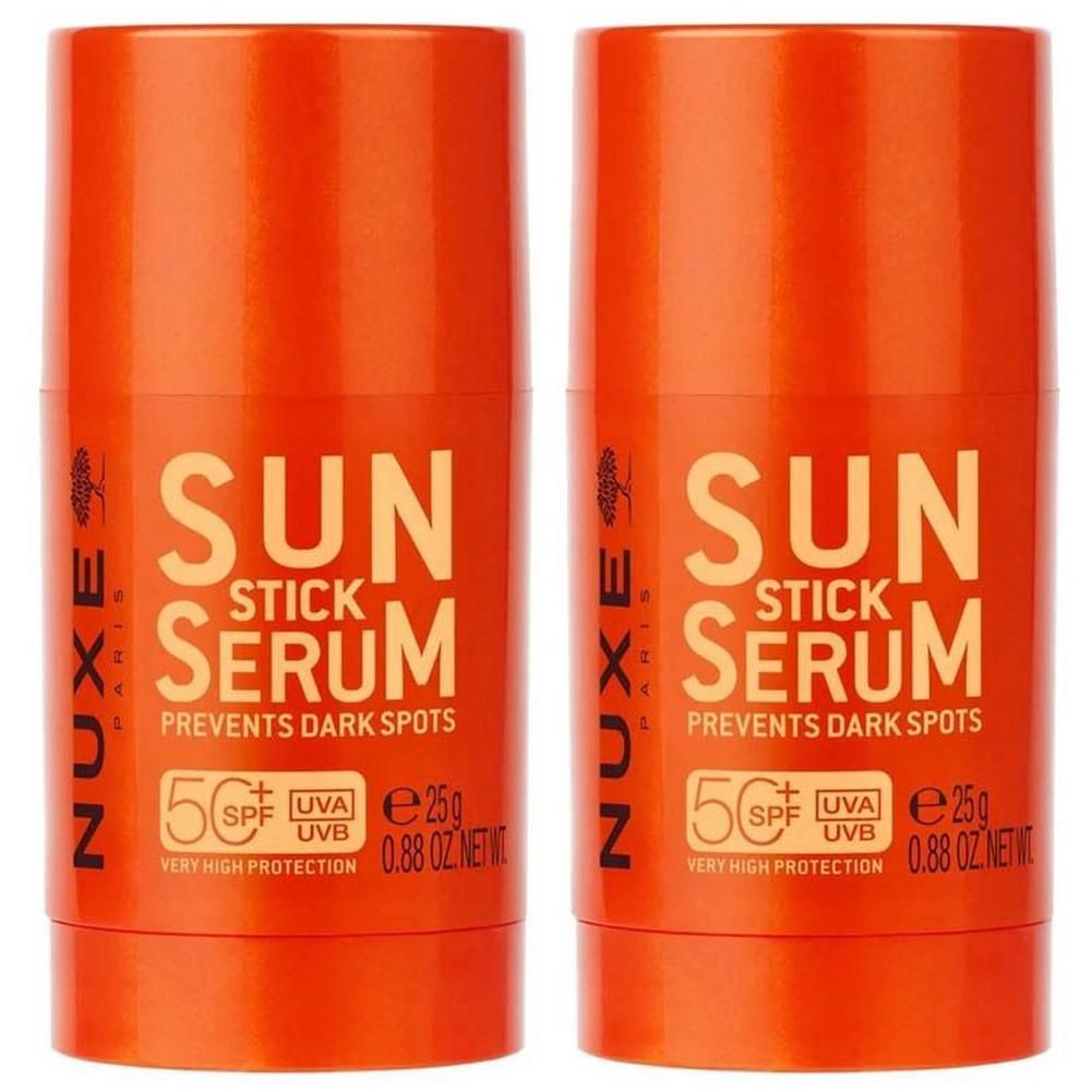 Twee Nuxe Sun Stick Serum Spf50+ in oranje sticks. Voorkomt donkere vlekken.