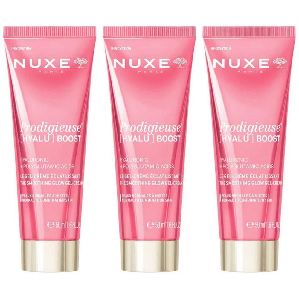 Drie Nuxe Prodigieuse [Hyalu] Boost Gladmakende Gel-Crème tubes, roze en gouden accenten.