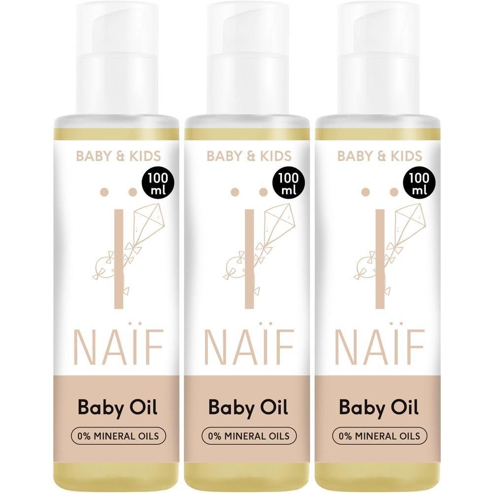Trois flacons d'huile pour bébé Naïf, 100 ml chacun, avec pompe.