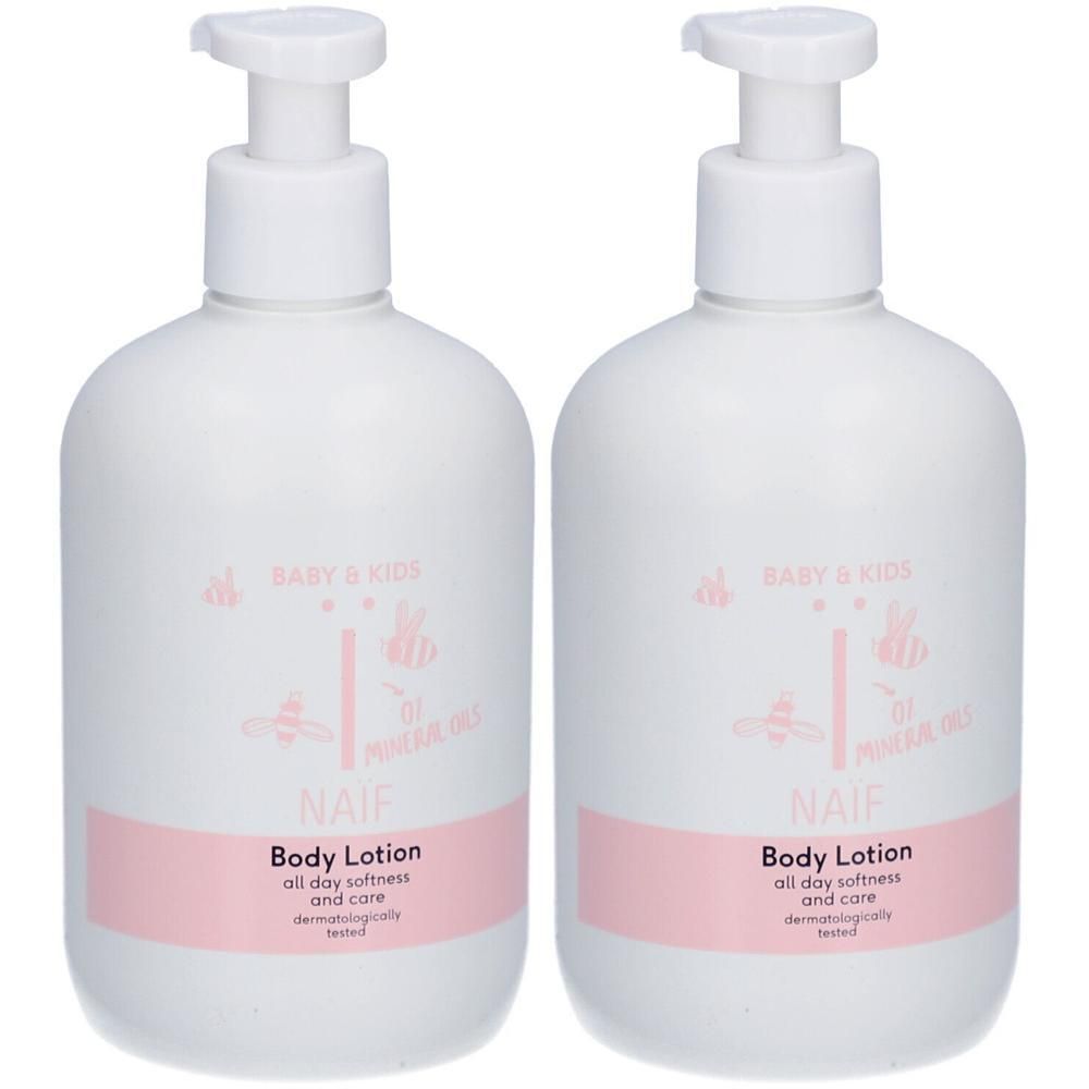 Twee witte pompflesjes Naïf Body Lotion voor baby's en kinderen.