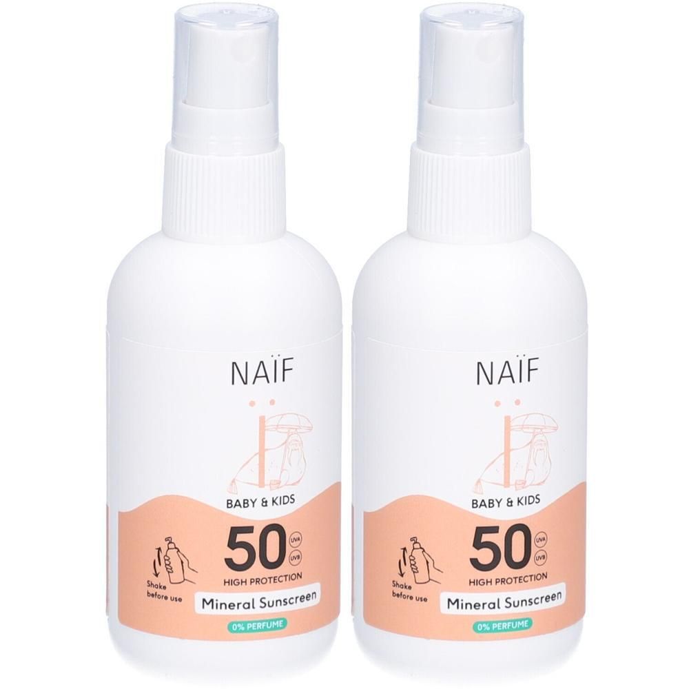 Twee flessen Naïf Mineraal Zonnebrandspray SPF 50 voor baby en kind. Wit met oranje etiket.