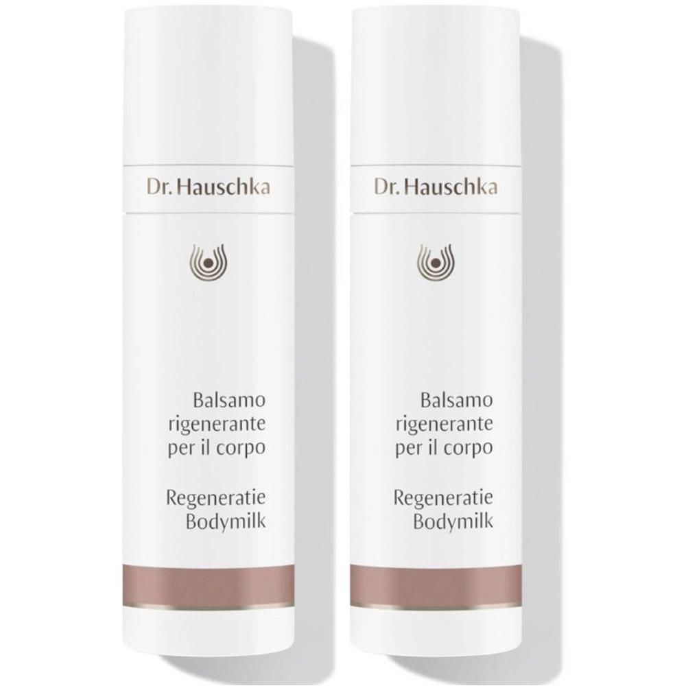 Twee flessen Dr. Hauschka Regeneratie Bodymilk met pompdispenser.