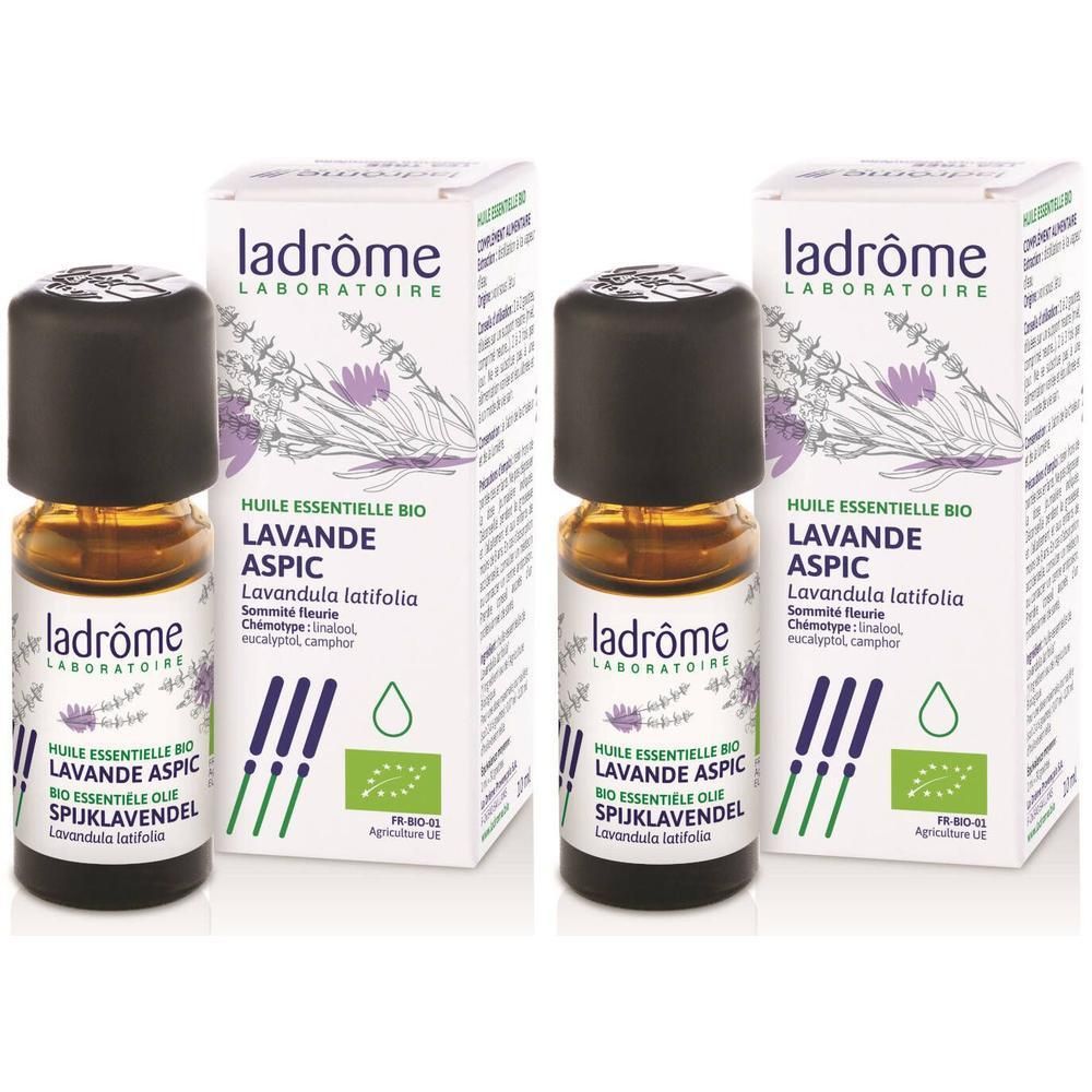 Deux flacons d'huile essentielle Ladrôme Lavande Aspic Bio avec leurs boîtes. Illustration de lavande sur les boîtes.