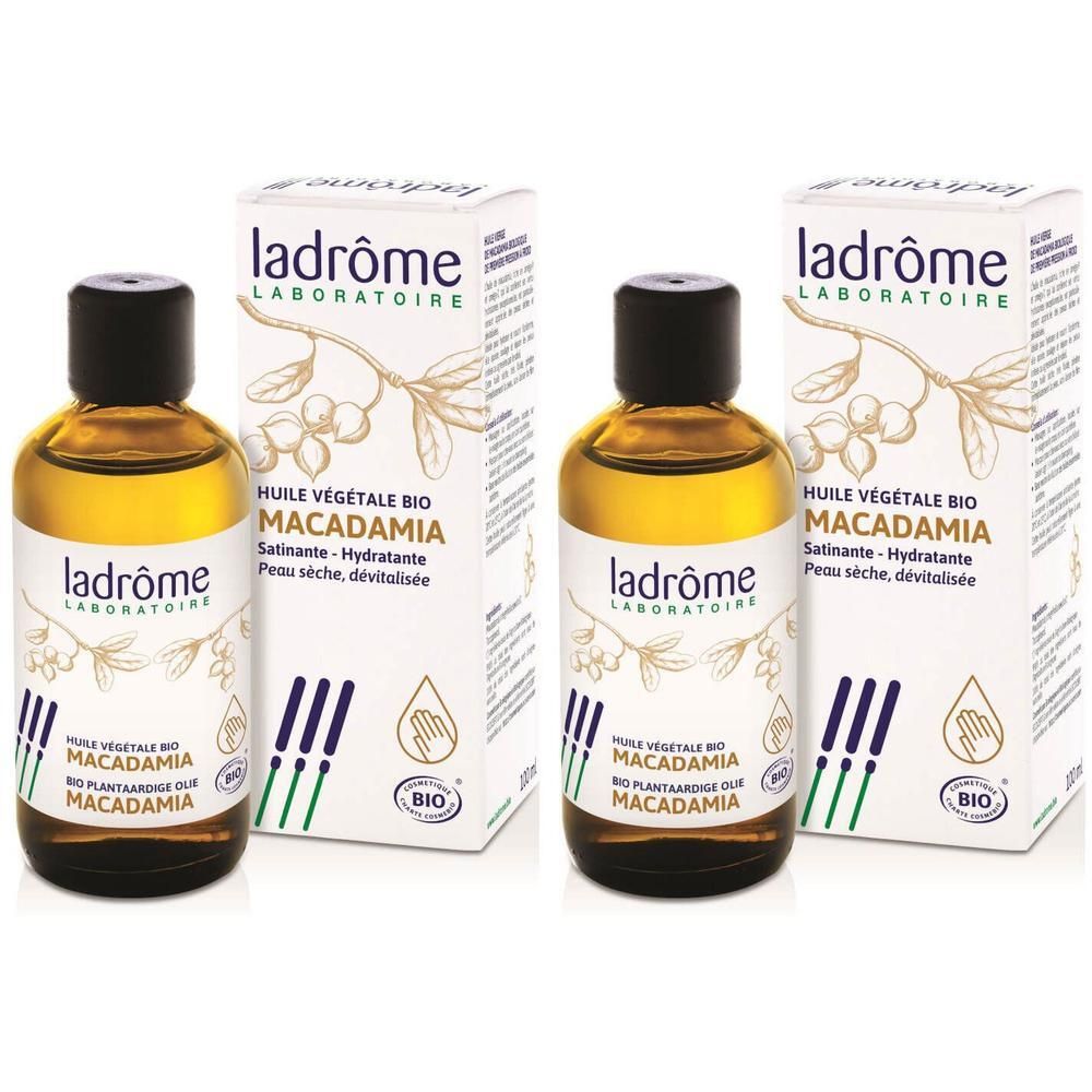 Deux flacons d'huile végétale bio de macadamia Ladrôme avec leurs boîtes. Liquide doré dans des flacons en verre avec bouchons noirs.