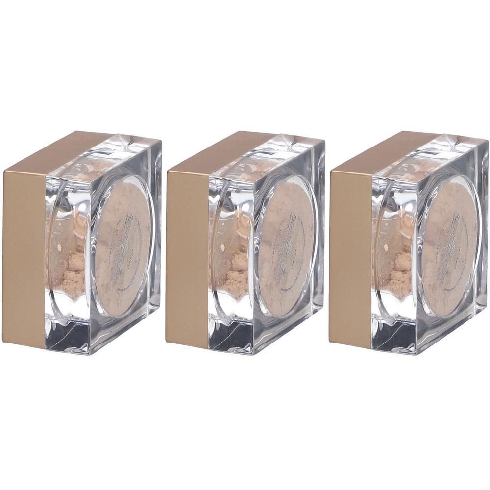 Drie transparante potjes met gouden deksels, gevuld met beige poeder.