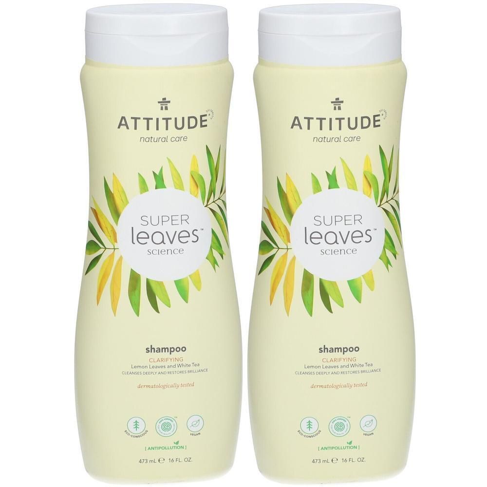 Deux bouteilles de shampooing clarifiant Attitude Super Leaves. Bouteilles jaune pâle avec motif de feuilles et texte.