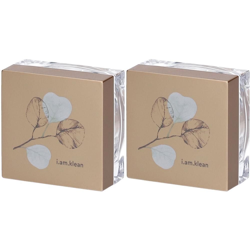 Twee i.am.klean Mattifying Powder verpakkingen met bladerenprint.