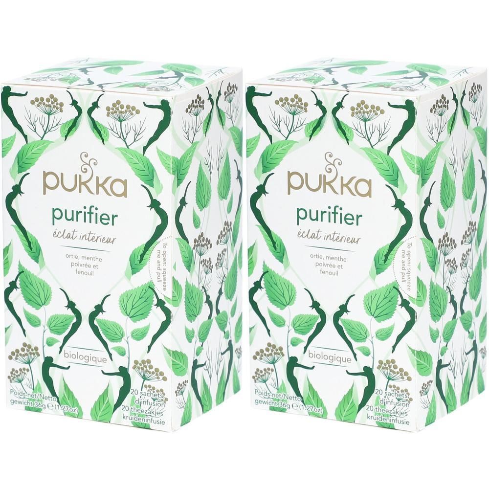Twee pakken Pukka Purifier thee met kruiden- en muntontwerp. "Biologique" en "20 Sachets" zijn zichtbaar.