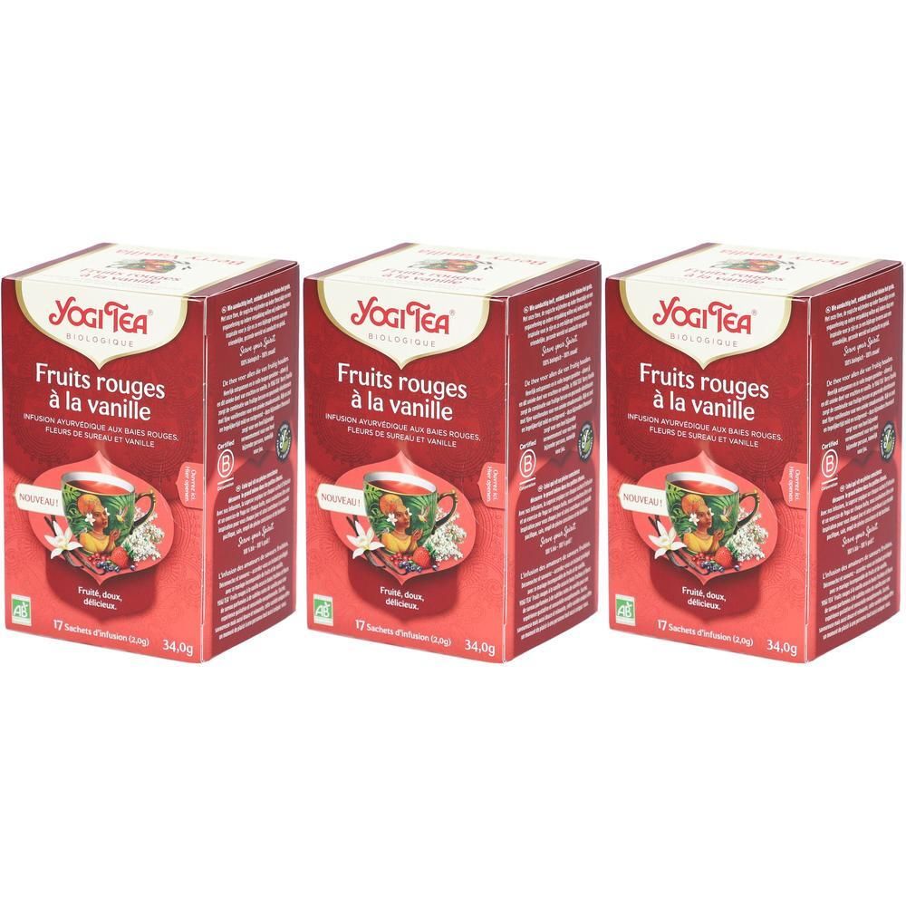 Trois boîtes de Yogi Tea Fruits Rouges à la Vanille. Emballage rouge avec une tasse de thé et des fruits.