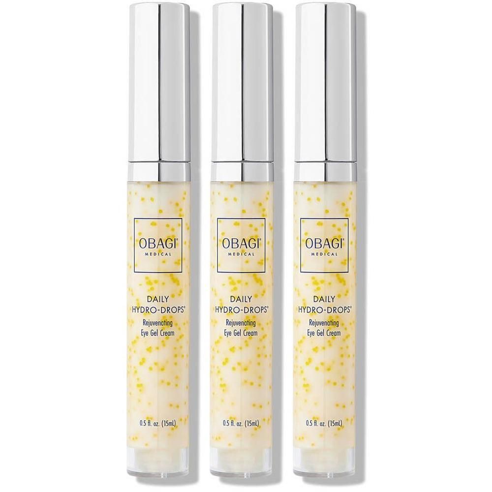 Trois flacons Obagi Medical Daily Hydro-Drops contenant des perles jaunes dans une crème transparente.