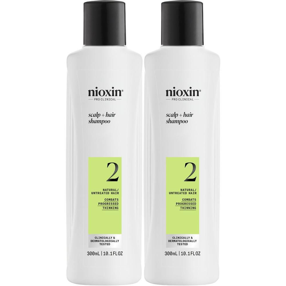 Twee Nioxin Systeem 2 Scalp + Hair Shampoo flessen, 300ml.