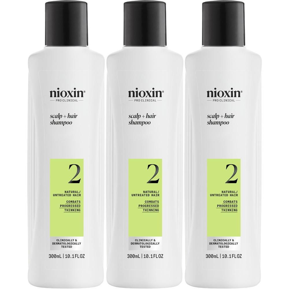 Trois bouteilles de shampooing Nioxin Système 2, 300ml.