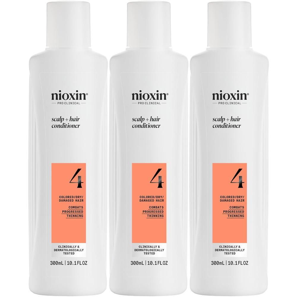 Trois bouteilles blanches de revitalisant Nioxin Scalp Care + Hair System 4.