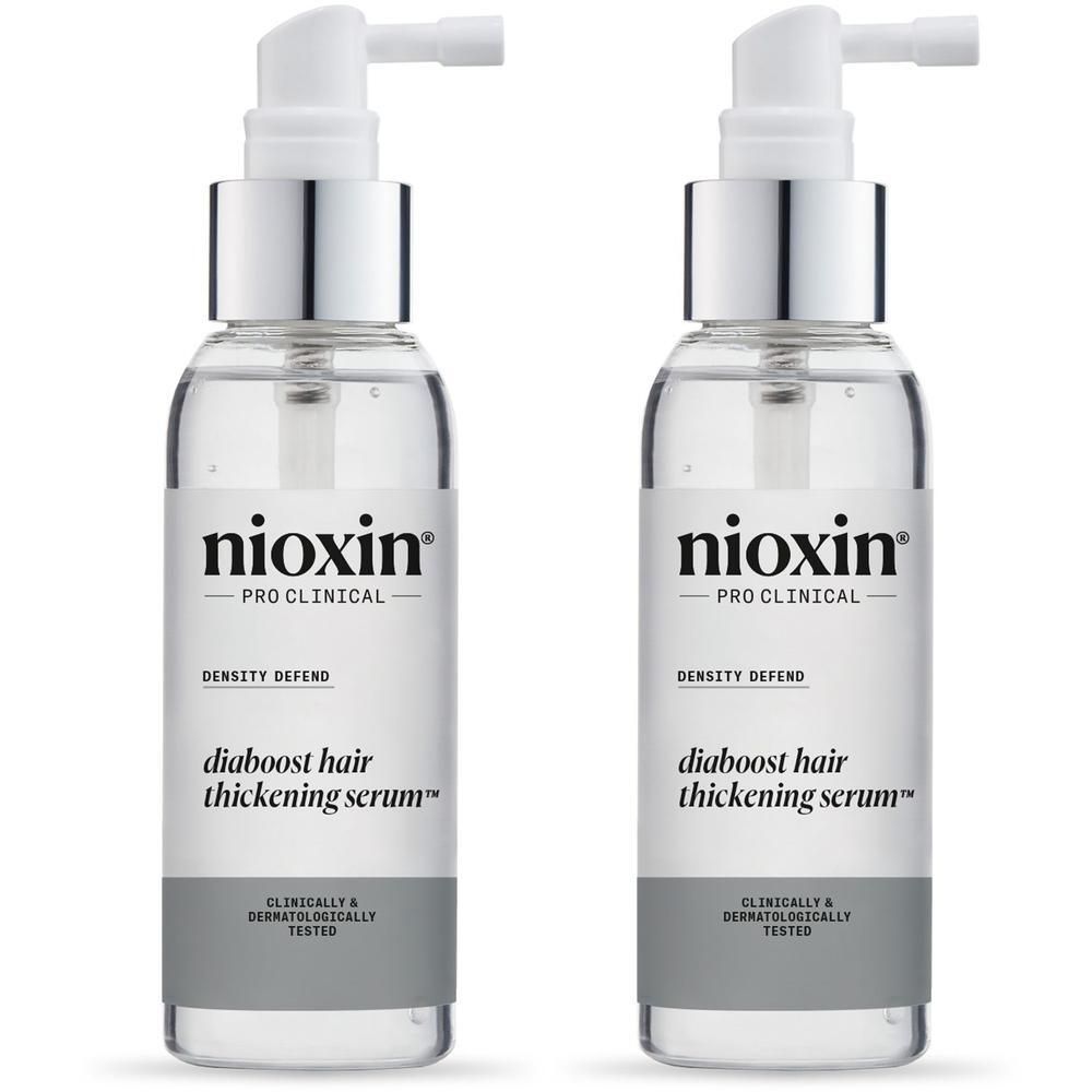 Twee flessen Nioxin Diaboost verdikkend serum met spray pomp.
