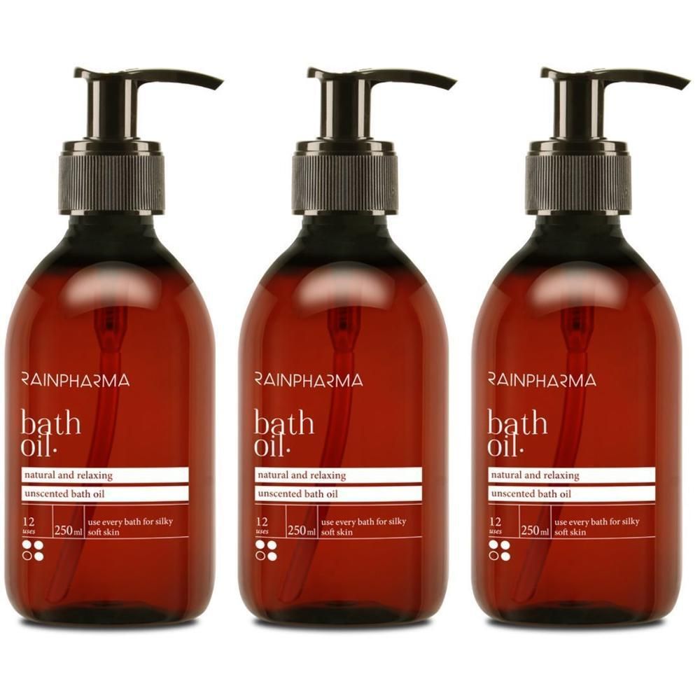 Trois flacons pompe marron contenant de l'huile de bain RainPharma. Chaque flacon contient 250 ml.
