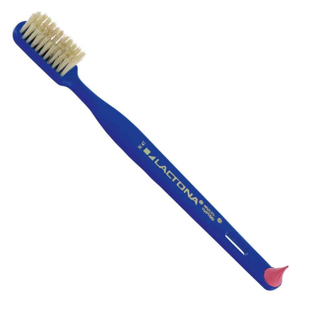 Blauwe Lactona tandenborstel met borstels en een roze rubberen applicator aan het uiteinde van het handvat.