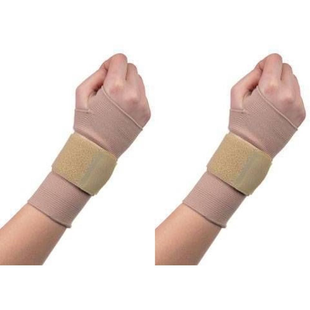 Deux bandages de poignet beiges avec fermeture velcro.