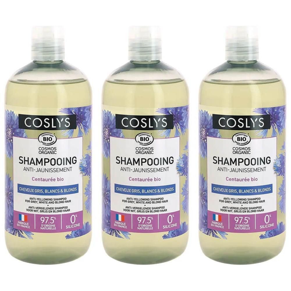 Trois bouteilles de shampoing anti-jaunissement COSLYS pour cheveux gris, blancs et blonds. Certifié bio.