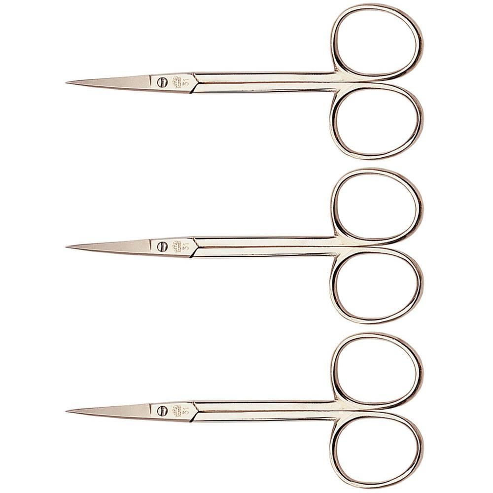 Drie metalen nagelriemschaartjes met gebogen bladen en twee vingerlussen.