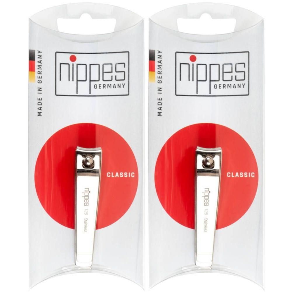 Deux coupe-ongles Nippes, design classique, couleur argentée, en emballage transparent.