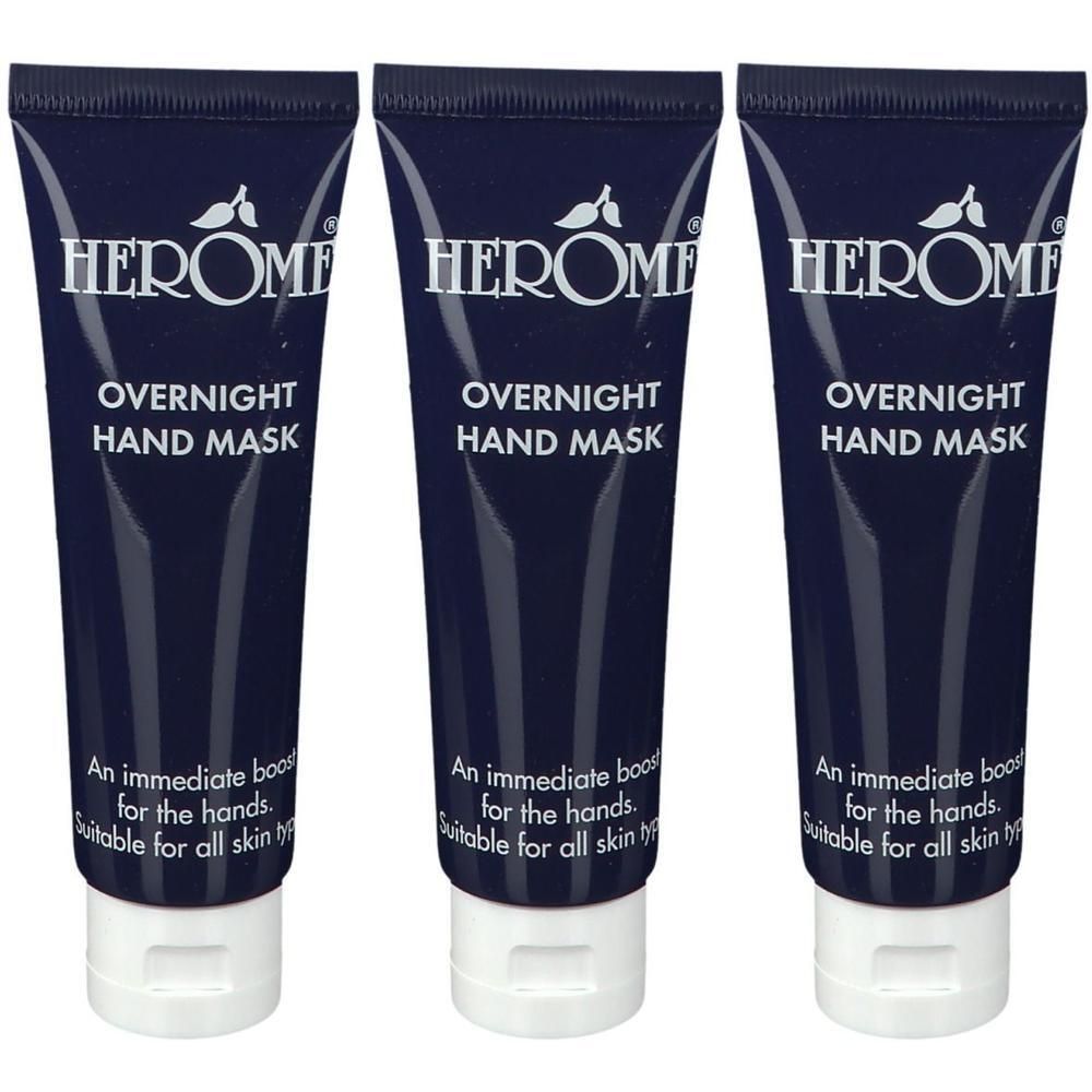 Trois tubes de Herôme Overnight Hand Mask avec bouchon blanc à rabat. Design bleu foncé avec inscription blanche.