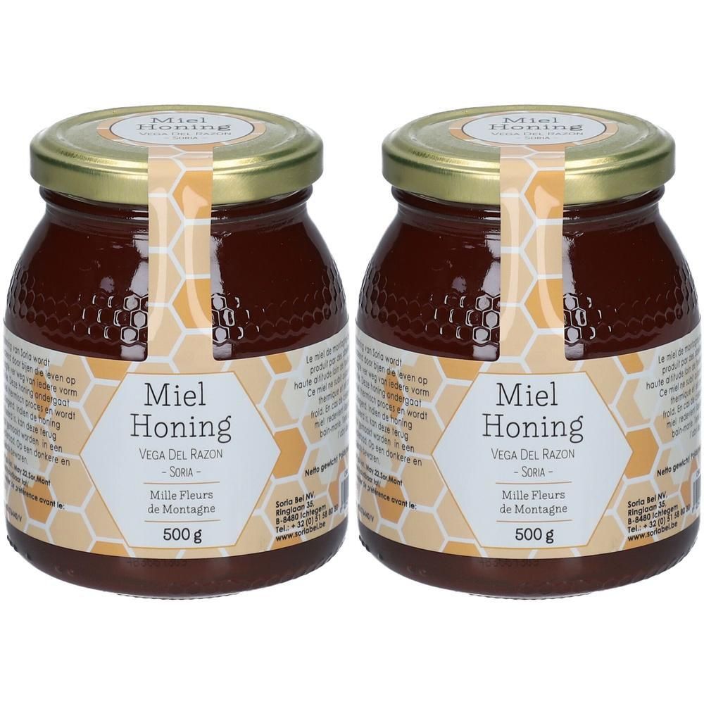 Twee potten honing met gouden deksels en etiketten met "Miel Honing" en "500 g".
