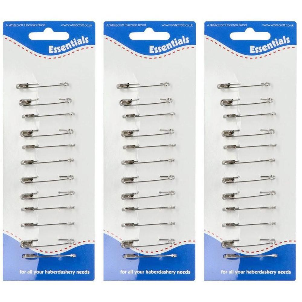 Drie pakken met 12 veiligheidsspelden, zilverkleurig.