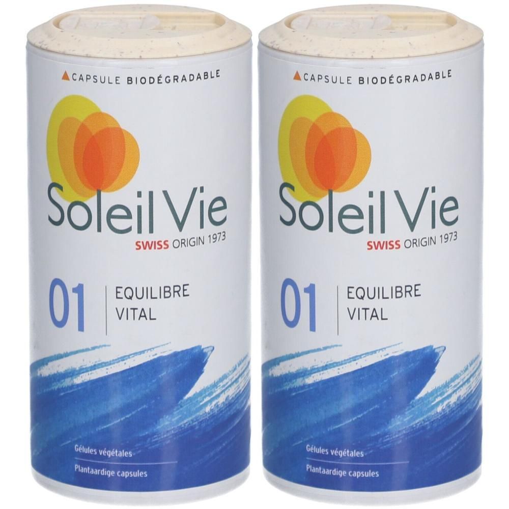 Twee potten L'Equilibre Vital, plantaardige capsules. "Capsule Biodegradable" en "Swiss Origin 1973" zijn afgedrukt.