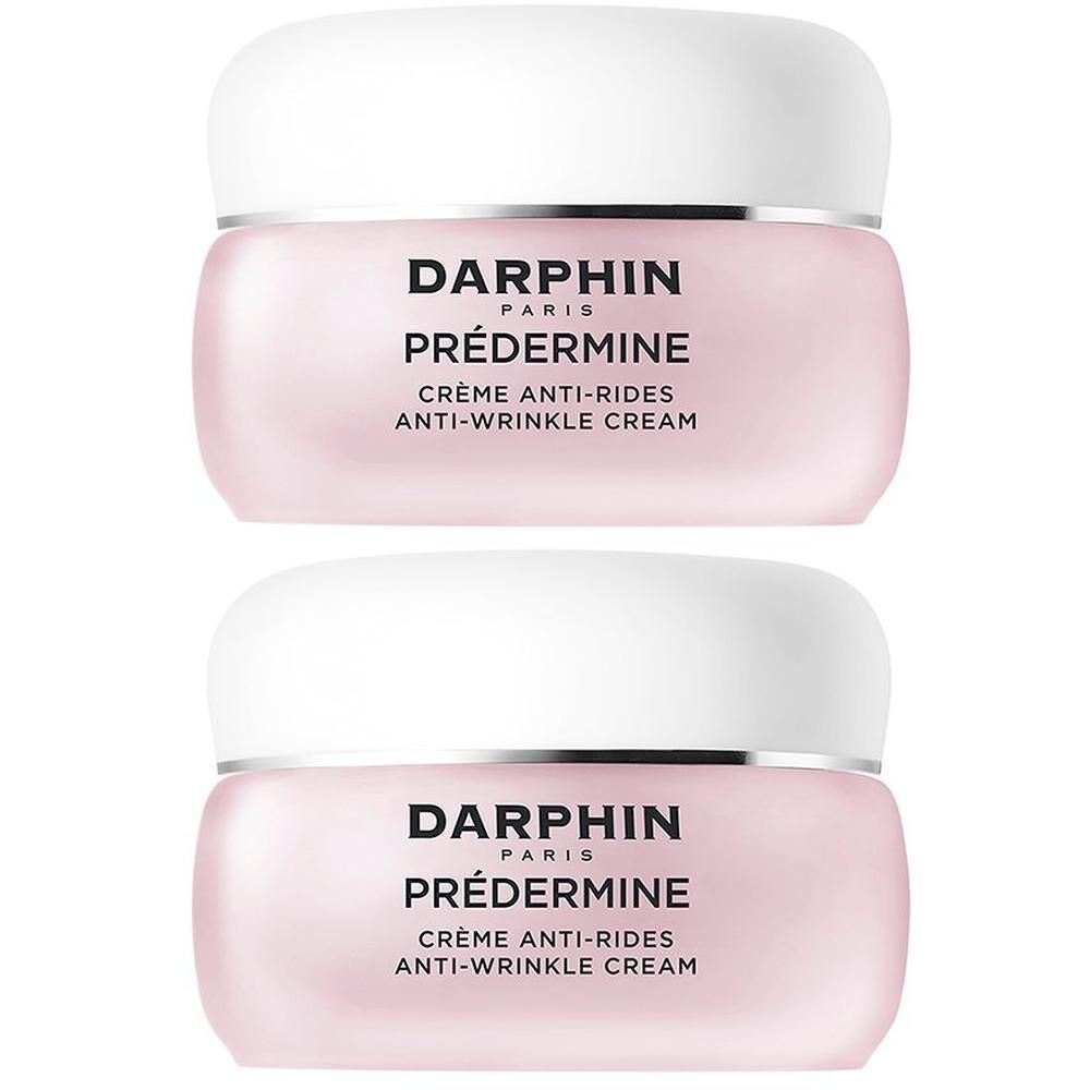Deux pots de crème anti-rides Darphin Prédermine en verre rose avec couvercle blanc.