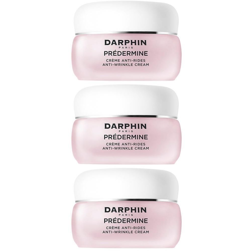 Drie roze Darphin Prédermine anti-rimpelcrème potjes met witte deksels. Tekst op de potjes.