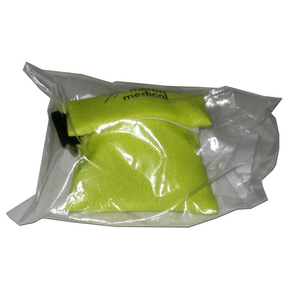 Masque de réanimation jaune dans son emballage transparent, avec inscription 'menin medical'.