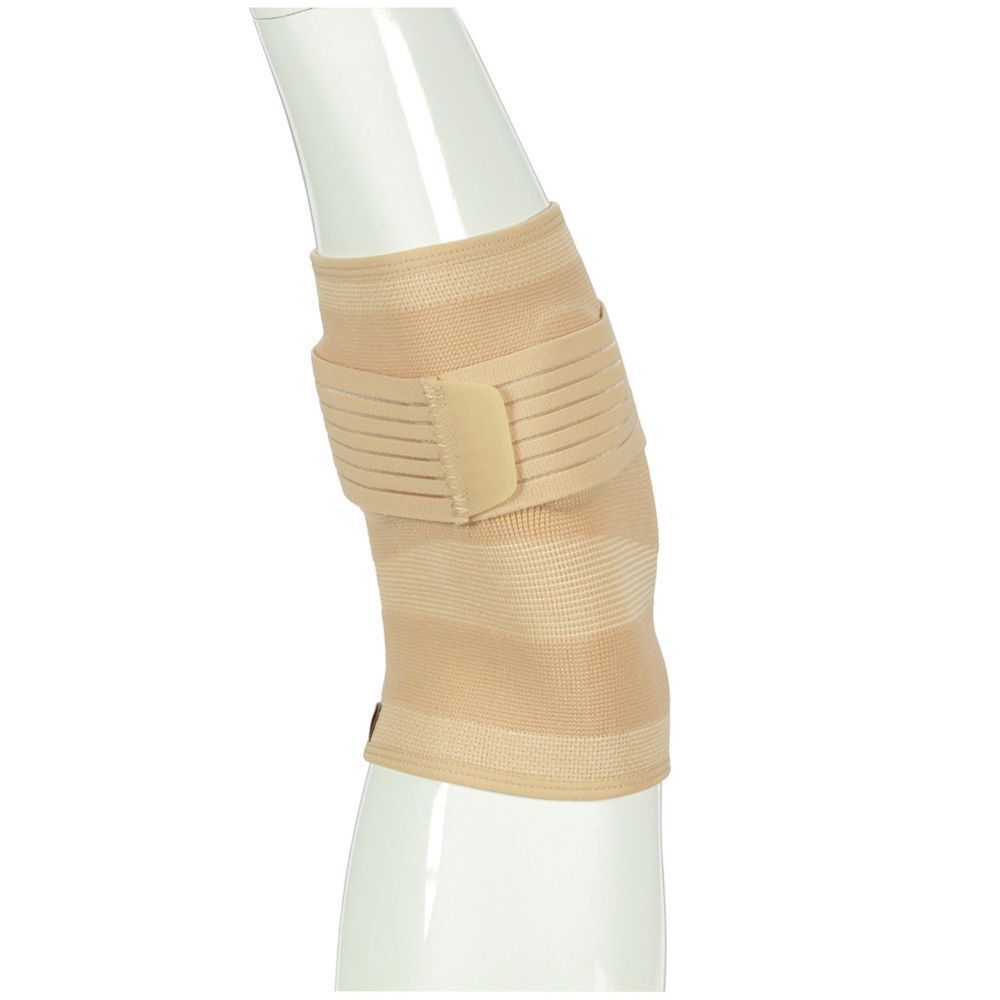 FUTURO Bandage de coude en matière élastique, beige.