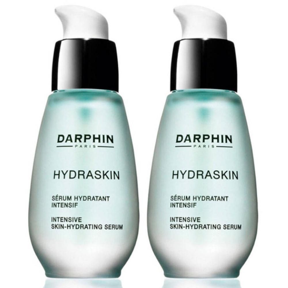 Deux flacons Darphin Hydraskin avec pompes. Flacons bleu clair, transparents avec col argenté et noir.