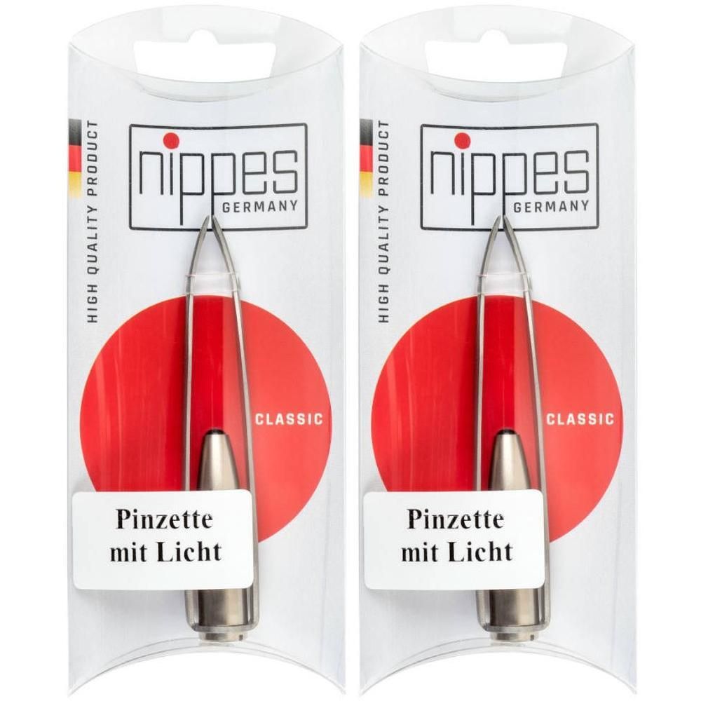 Twee Nippes pincetten met licht in verpakking. Klassiek design, Made in Germany.
