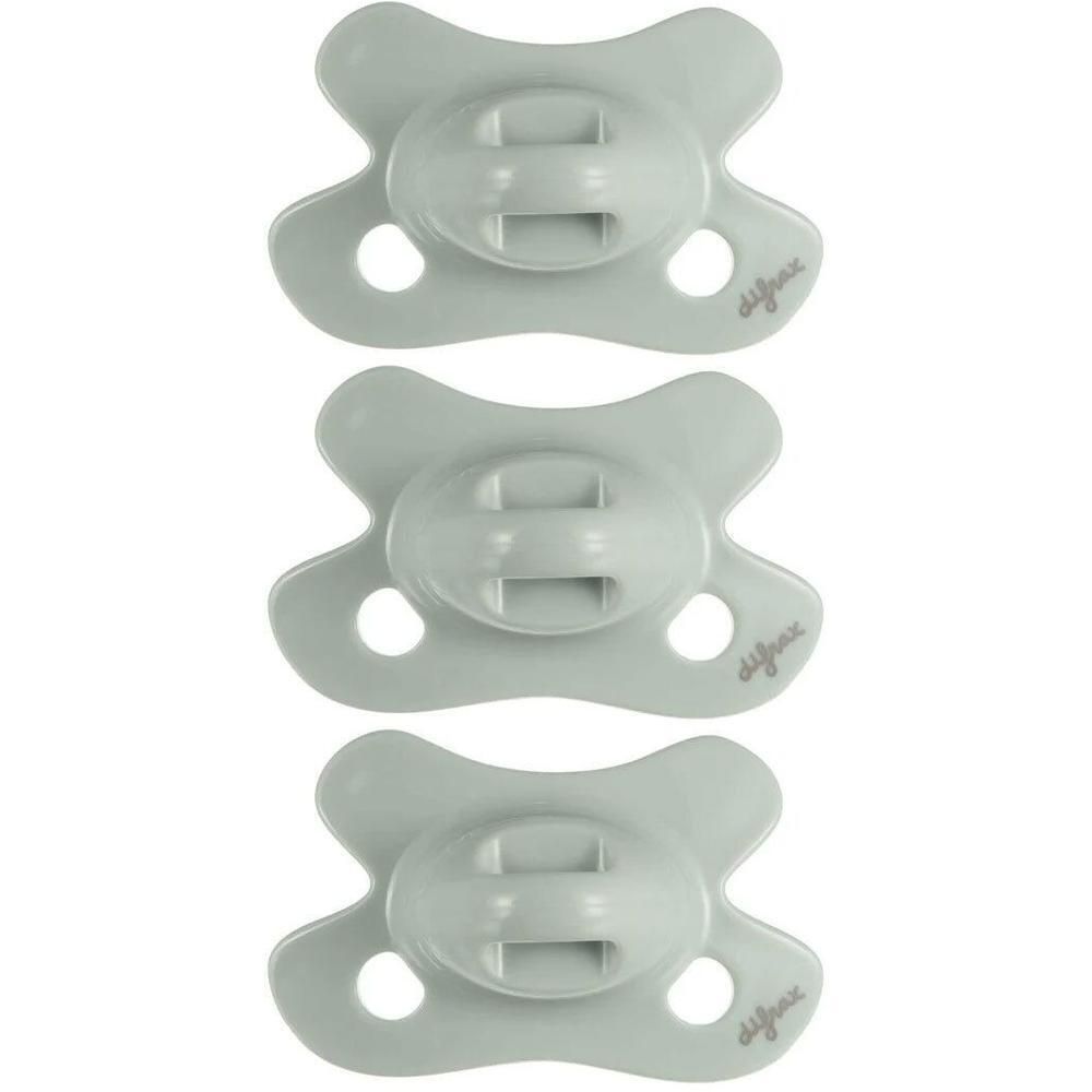 Trois sucettes Difrax pour nouveau-nés, couleur gris clair, avec tétine dentaire et trous d'aération.