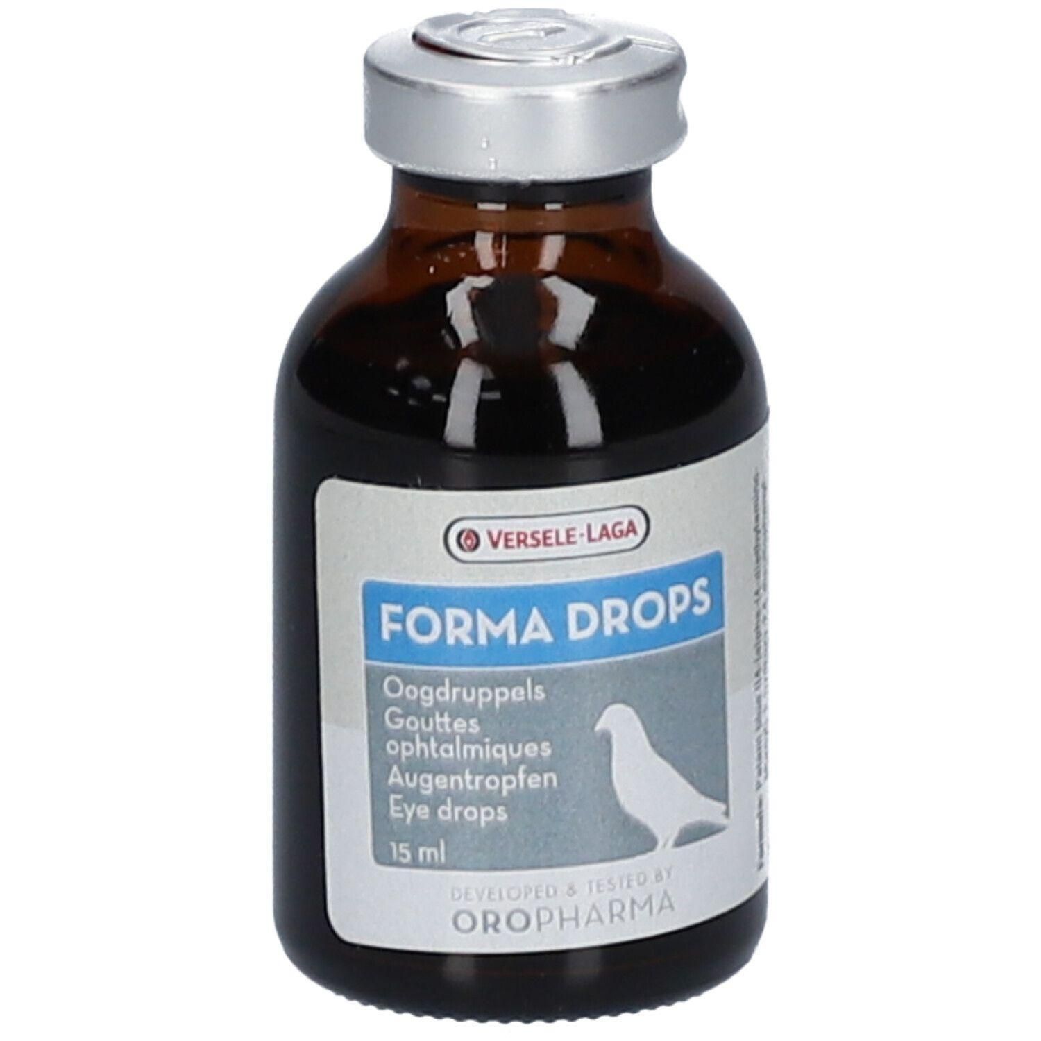 Bruine glazen fles met zilveren dop, 15 ml Forma Drops oogdruppels.
