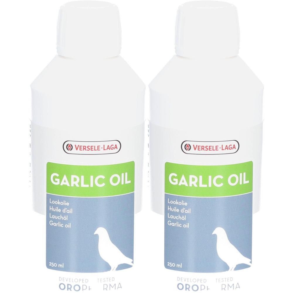 Deux bouteilles d'Huile d'Ail Oropharma, chacune de 250 ml. Une colombe est représentée sur l'étiquette.