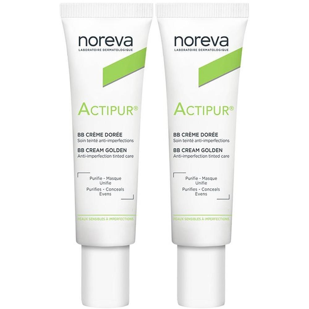 Twee Noreva Actipur BB Crème Dorée tubes met witte dop en groene accenten.