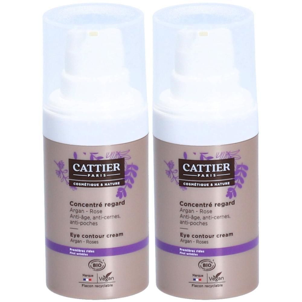 Deux flacons de crème contour des yeux Cattier Concentré Regard avec pompes. Flacons beiges avec bande violette.