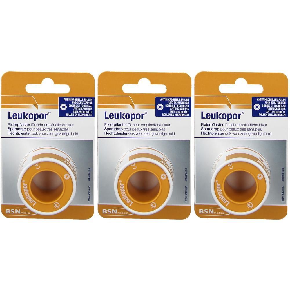 Trois rouleaux de sparadrap Leukopor sur support blanc, emballés dans une carte orange.