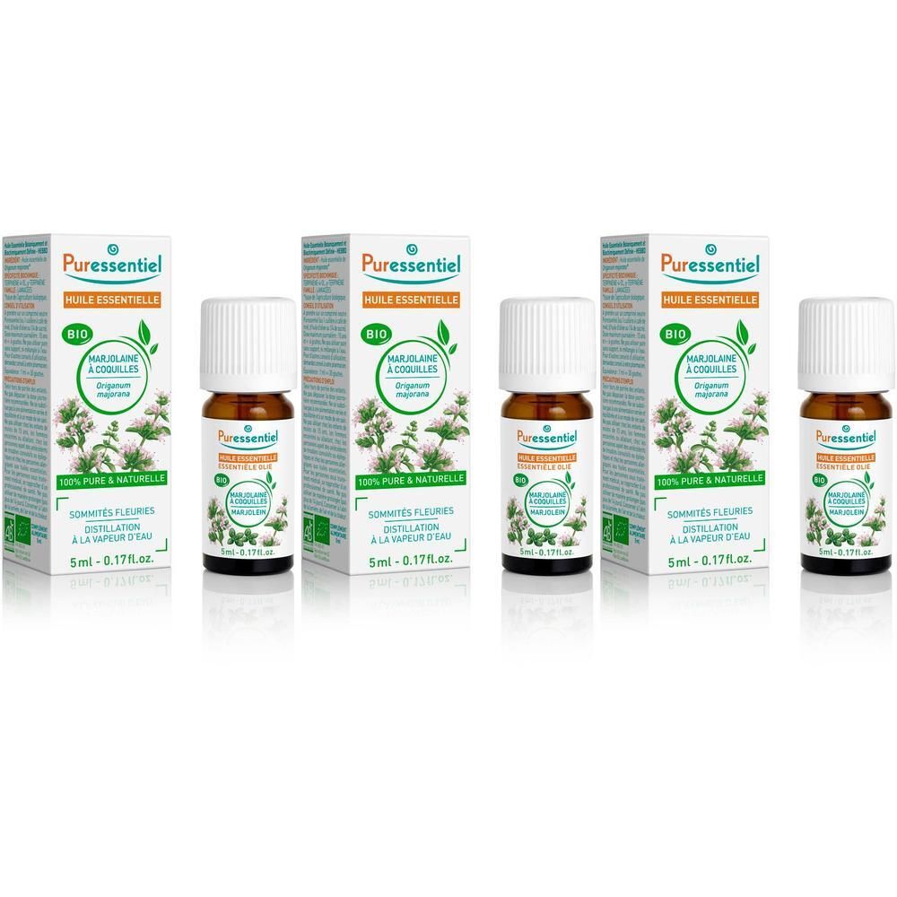 Puressentiel Bio Marjolein etherische olie in bruine fles met witte dop, naast de verpakking.
