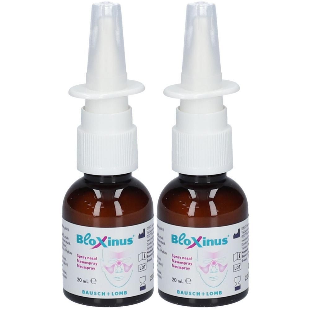 Twee Bausch & Lomb Bloxinus neussprays van elk 20 ml. Bruine glazen flesjes met witte spuitkop en applicator.