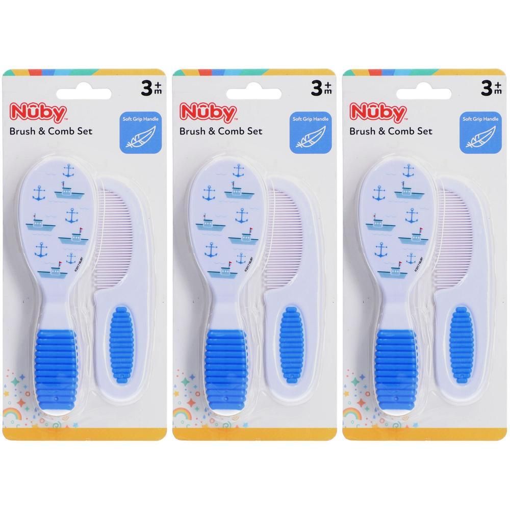 Nuby borstel- en kamset met blauw handvat en boot- en ankerontwerp.